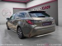 Toyota corolla touring sports hybride my21 122h design garantie 12 mois occasion paris 17ème (75)(porte maillot) simplicicar...