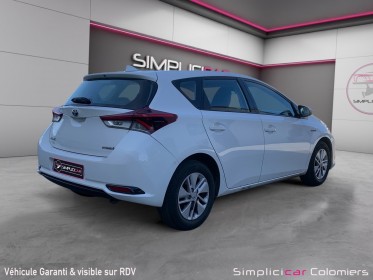 Toyota auris my17 hybride 136h tendance / garantie 12 mois / camera / clim occasion simplicicar colomiers  simplicicar...